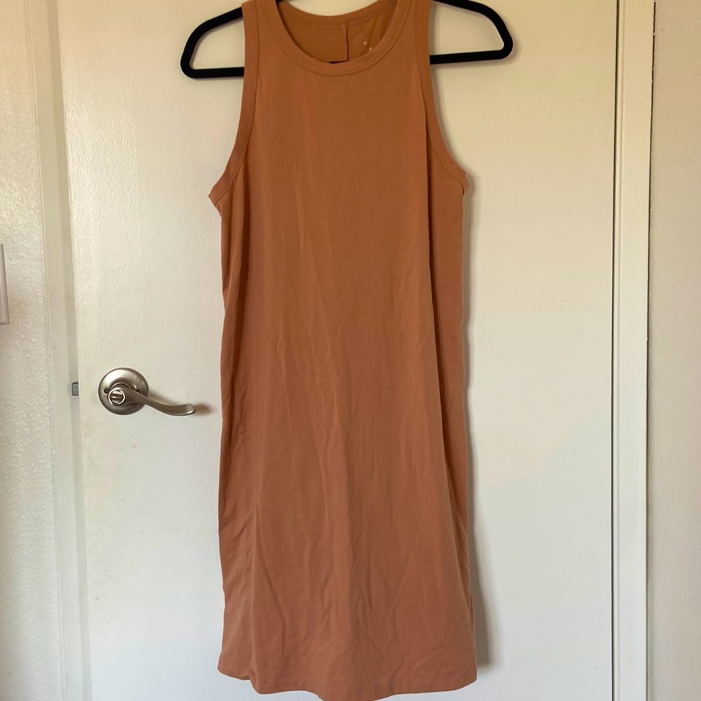 NWOT peach color stretchy dress size M